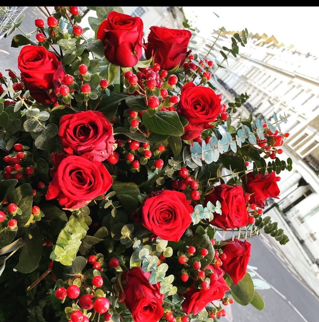 Red roses bouquet with greenery from our Gurnee Flower Shop.