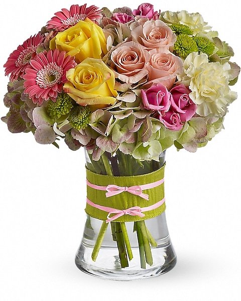 : Colorful rose and lily mixed flower arrangement in pink vase