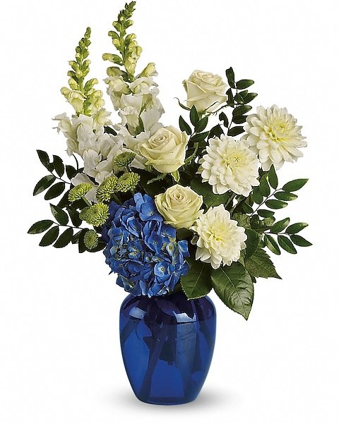 Blue hydrangeas and white roses arranged by the best florist in Gurnee IL