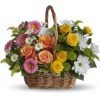 Yellow rose and mixed flower basket arrangement