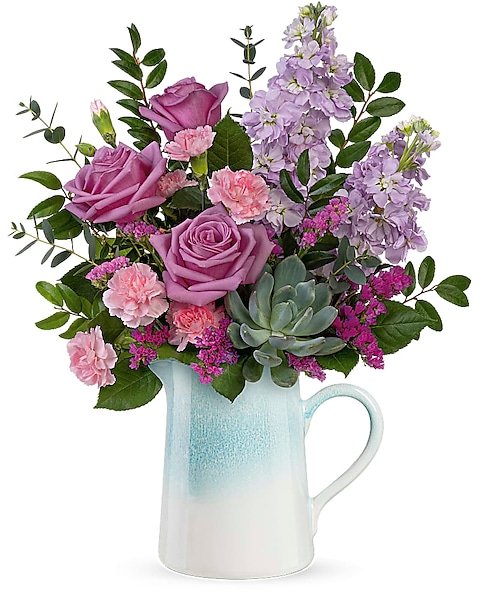 Pink roses and succulent arrangement in a white jug for flower delivery Vernon Hills IL