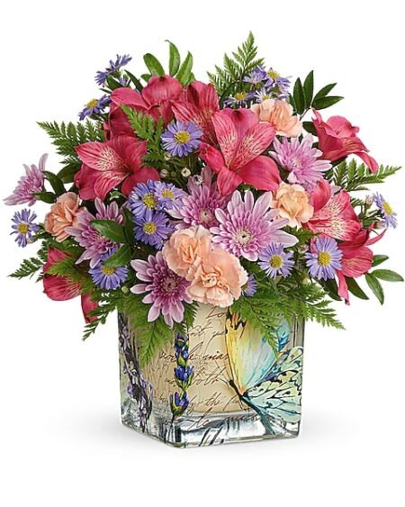 Purple and pink floral arrangement with roses and daisies for flower delivery Waukegan IL