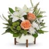 White lilies and peach roses floral arrangement from Gurnee florist
