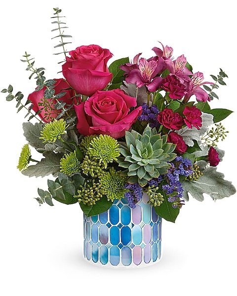 Pink and red rose floral arrangement in blue vase from Gurnee florist