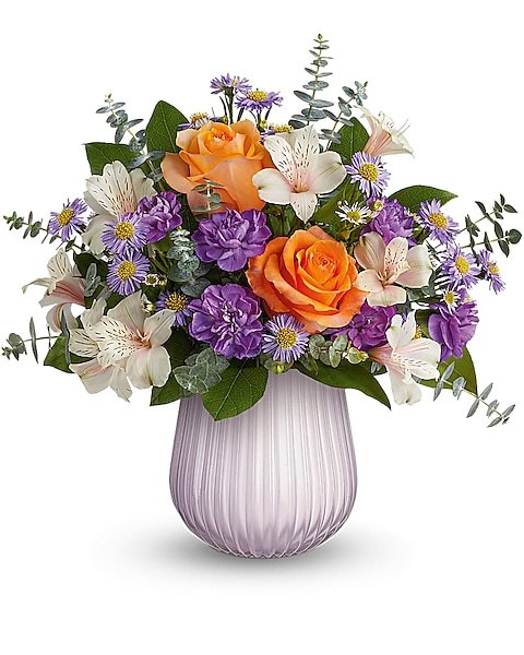Peach roses and purple flowers garden-style arrangement from florist in Vernon Hills IL