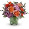 : Peach roses with purple accent flowers for flower delivery Waukegan IL