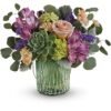 Mix orchids arranged in a green square vase, available for delivery in Gurnee IL