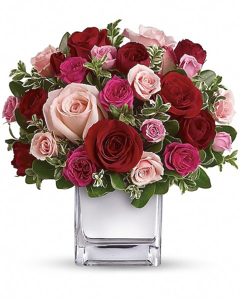 Red and pink rose floral arrangement in glass cube for flower delivery Waukegan IL