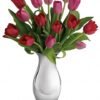 Red tulip flower bouquet in white ceramic vase