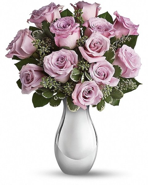 Lavender rose floral arrangement in white vase from florist in Grayslake IL