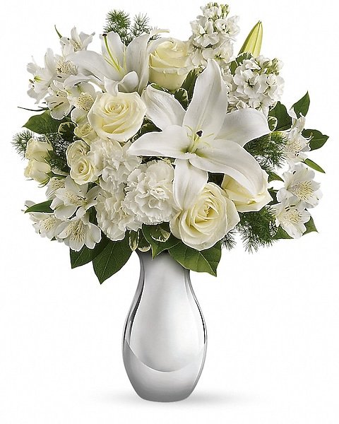 Elegant white lilies and roses in a vase from Gurnee flower shop