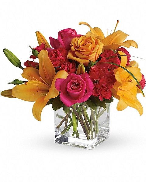Rose and yellow lily floral bouquet in clear vase, available from Gurnee florist