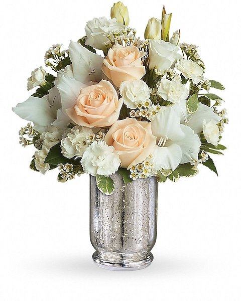 White and peach rose floral arrangement in textured vase from Gurnee flower shop