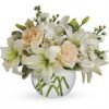White lilies and pink roses in a round vase from florist in Grayslake IL
