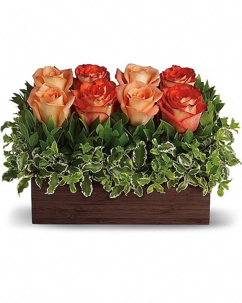 Orange rose floral arrangement in wooden box from florist in Grayslake IL