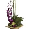 Vertical orchid and tropical greenery arrangement from Gurnee florist