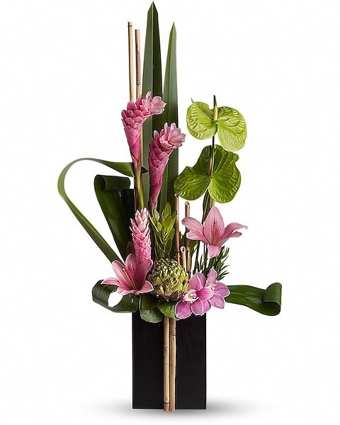 Elegant floral arrangement with lilies and mixed flowers in a vase from Gurnee florist