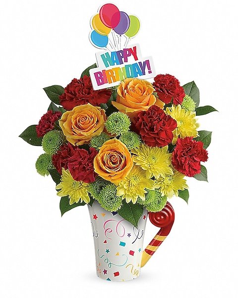 Colorful birthday-themed floral arrangement from Gurnee florist