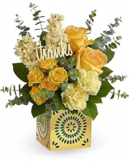 Yellow and white floral arrangement with greenery from florist in Grayslake IL