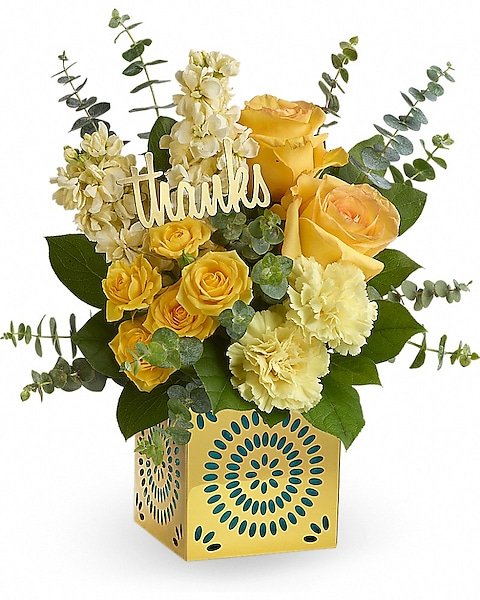 Yellow and white floral arrangement with greenery from florist in Grayslake IL