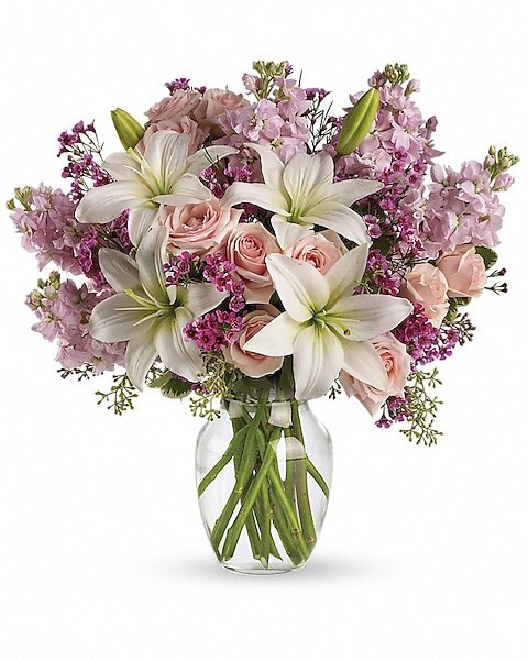 Purple and pink mixed flower bouquet with ribbon