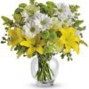 Yellow lily and white daisy bouquet in clear vase