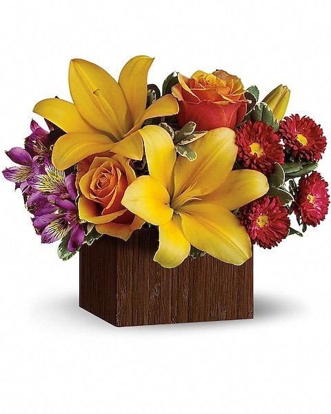 Yellow rose and mixed floral arrangement in a wooden vase for flower delivery Grayslake IL
