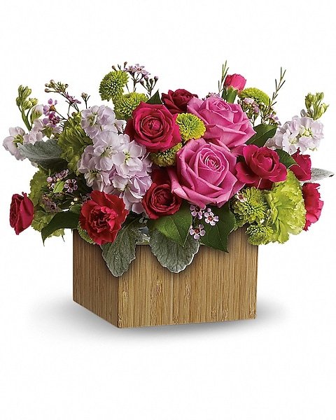 Mixed roses and pink flowers in a square vase available for delivery Waukegan IL