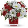 Purple floral bouquet in a red vase, available from Gurnee florist