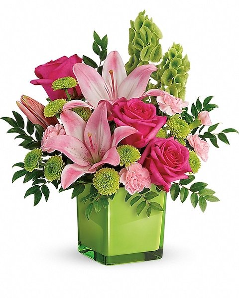 Pink lily and rose mixed flower arrangement in green vase