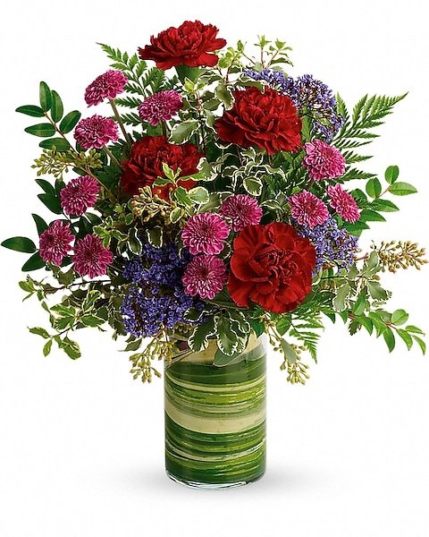Peach roses with blue accent flowers arranged by florist in Vernon Hills IL