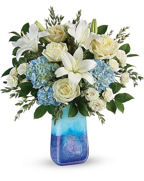 White roses with blue accent flowers arranged by Gurnee flower shop