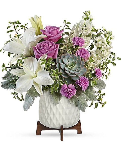 Elegant pink roses and white lilies in a vase from Gurnee flower shop