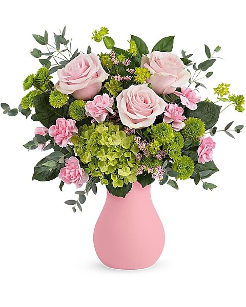 Pink and blush rose floral arrangement in pink vase from Gurnee florist