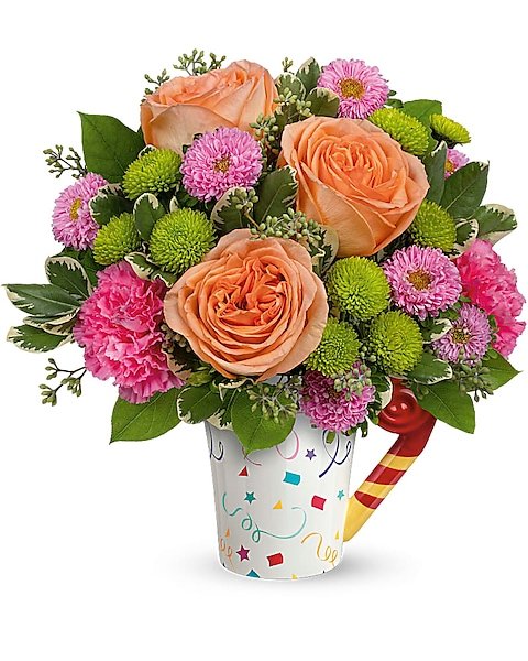 Colorful birthday-themed floral arrangement from Gurnee florist