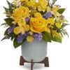 Yellow roses with purple accent flowers arranged by Gurnee florist