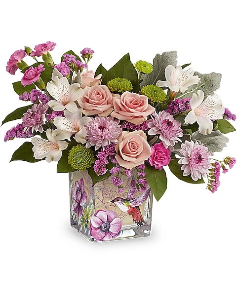 Pink rose and mixed flower arrangement in square container