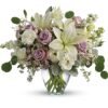 White lilies and lavender roses floral arrangement from Gurnee flower shop