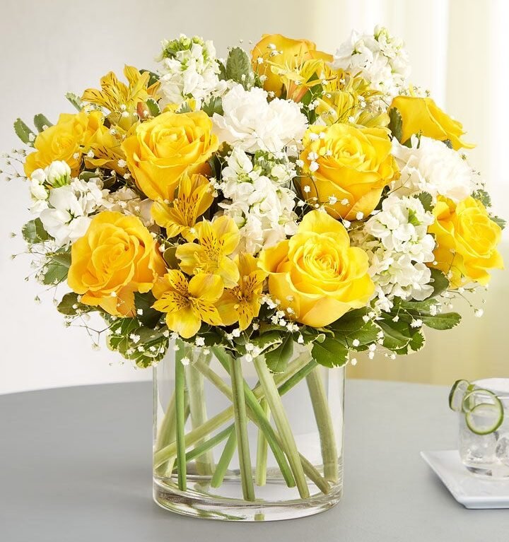 Elegant floral arrangement of yellow and white roses by florist in Gurnee IL