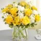 Elegant floral arrangement of yellow and white roses by florist in Gurnee IL