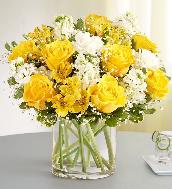 Elegant floral arrangement of yellow and white roses by florist in Gurnee IL