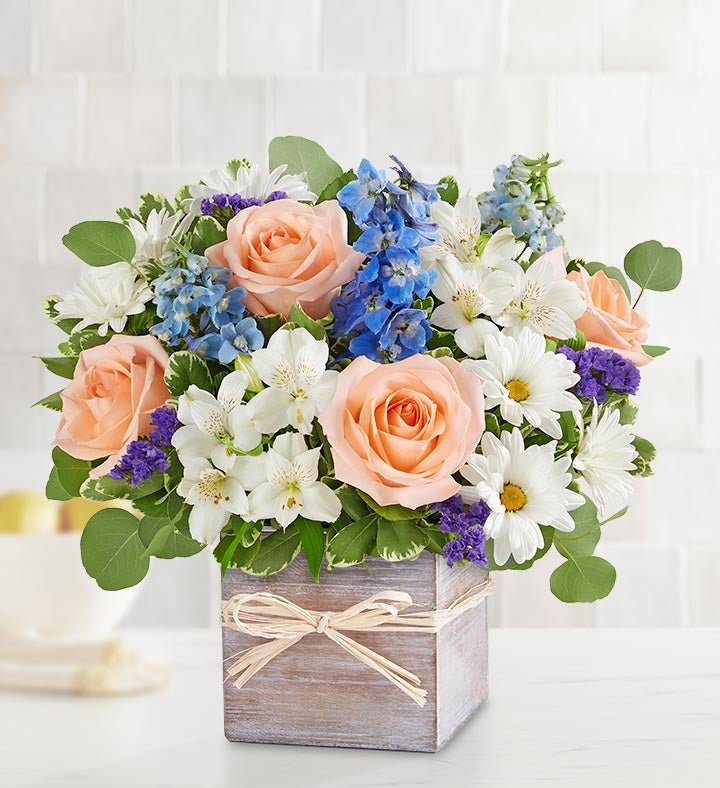 Elegant floral arrangement in square vase from florist in Grayslake IL