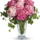 Soft pink daisy and rose arrangement from elegant flower shop in Gurnee IL