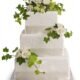 Elegant white wedding cake with floral accents available from Gurnee florist