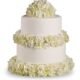 Elegant white wedding cake decorated with flowers from Gurnee florist