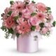 Soft pink daisy and rose arrangement from elegant flower shop in Gurnee IL