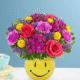 Cheerful bright floral bouquet with smiley vase by the best florist in Gurnee IL