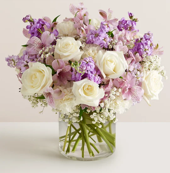 Elegant floral arrangement with purple and white flowers by florist in Vernon Hills IL